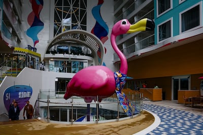 A flamingo installation looms large over the family-friendly Surfside neighborhood on the Icon of the Seas cruise ship. Getty Images