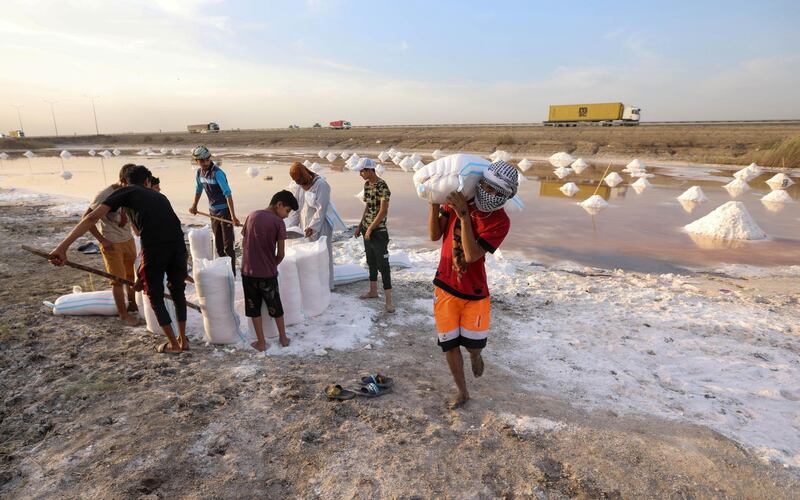 Iraqi salt collectors can expect to earn about $0.35 to $0.40 for every 30 kilograms of salt gathered. Reuters