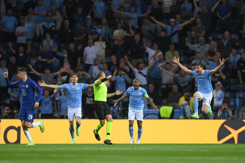 Manchester City unsuccessfully appeal to Spanish referee Antonio Mateu Lahoz for a penalty during the Champions League final against Chelsea at the Dragao stadium in Porto on Saturday, May 29. AFP