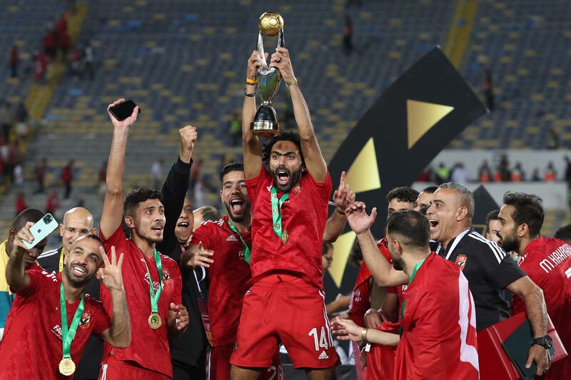 Hussein el-Shahat lifts the CAF Champions League trophy after Al Ahly beat Wydad Casablanca in the final at the Mohammed V Stadium on June 11, 2023.  AFP