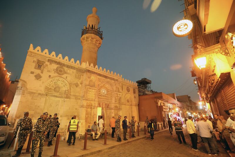 Police stand guard outside the restored Al-Aqmar Mosque in Cairo, Egypt. EPA