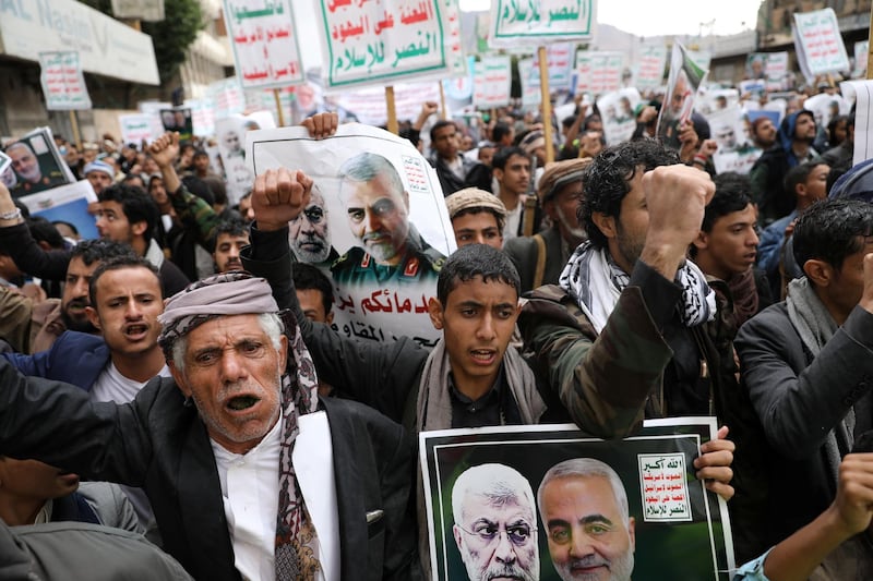Supporters of the Houthis rally to denounce the US killing of Iranian military commander Qassem Suleimani and Iraqi militia commander Abu Mahdi Al Muhandis, in Sanaa, Yemen. Reuters