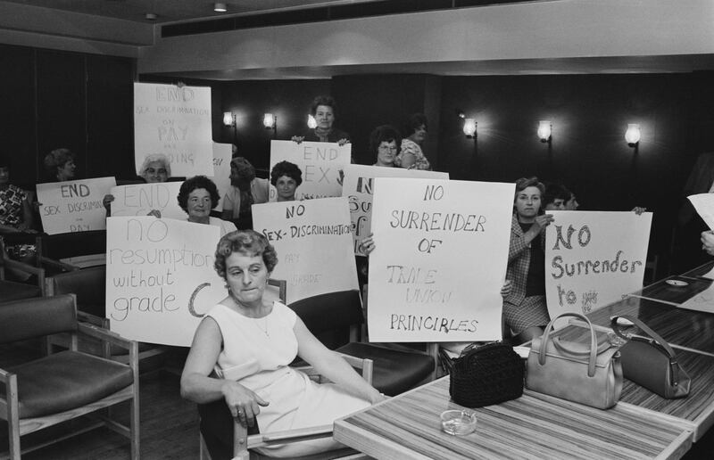 Striking women machinists from the Ford plant at Dagenham protest to hear outcome of union negotiations at New Ambassador Hotel, UK, 18th June 1968. (Photo by Ballard/Daily Express/Hulton Archive/Getty Images)