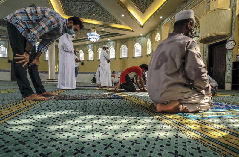 Abu Dhabi, United Arab Emirates, August 3, 2020.   
Worshippers at the Bani Hashim Mosque at the Al Maqta area during the first day restrictions have been eased on Mosque's in Abu Dhabi to allow 50% occupancy.
Victor Besa /The National
Section: NA
Reporter: