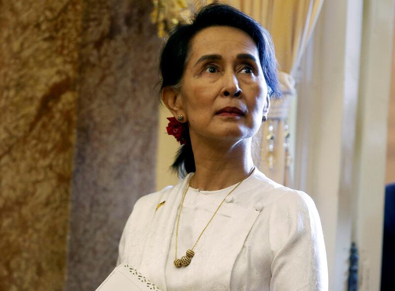 FILE PHOTO: Myanmar's State Counsellor Aung San Suu Kyi  is seen while she waits for a meeting with Vietnam's President Tran Dai Quang (not pictured) at the Presidential Palace during the World Economic Forum on ASEAN in Hanoi, Vietnam September 13, 2018. REUTERS/Kham/Pool/File Photo