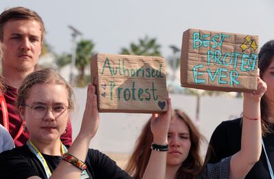 Climate activists during a protest demanding climate justice and human rights during the UN climate summit in Egypt. EPA