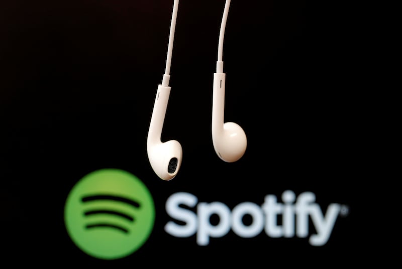 Spotify's Wrapped lists allow users to view detailed information, such as the number of artists they listened to and their most played song of the year. Reuters