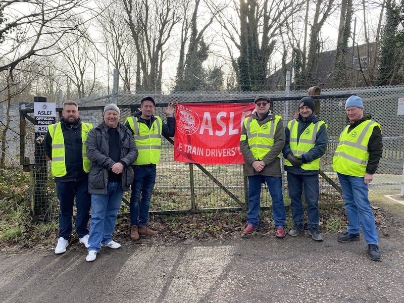 Aslef union members at a picket line outside Rickmansworth Underground station. PA