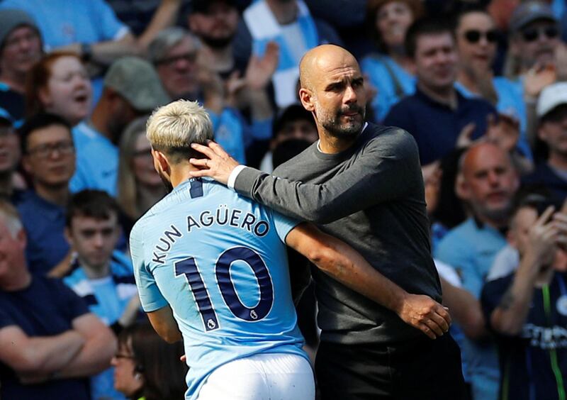 Manchester City's Sergio Aguero is substituted as Manchester City manager Pep Guardiola looks on. Reuters