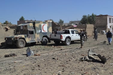 Afghan security personnel arrive at the site of a car bomb attack that targeted an intelligence unit in Ghazni on July 7, 2019. AFP