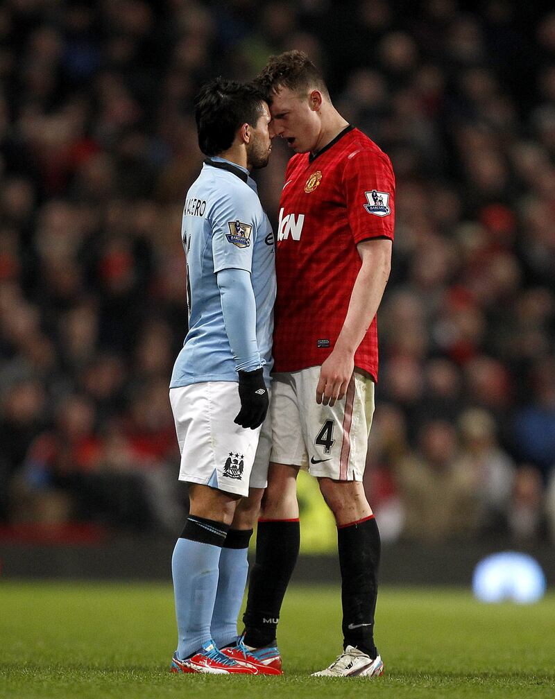 Manchester City's Sergio Aguero and Phil Jones of Manchester United square-up during the Premier League derby at Old Trafford in April, 2013. PA