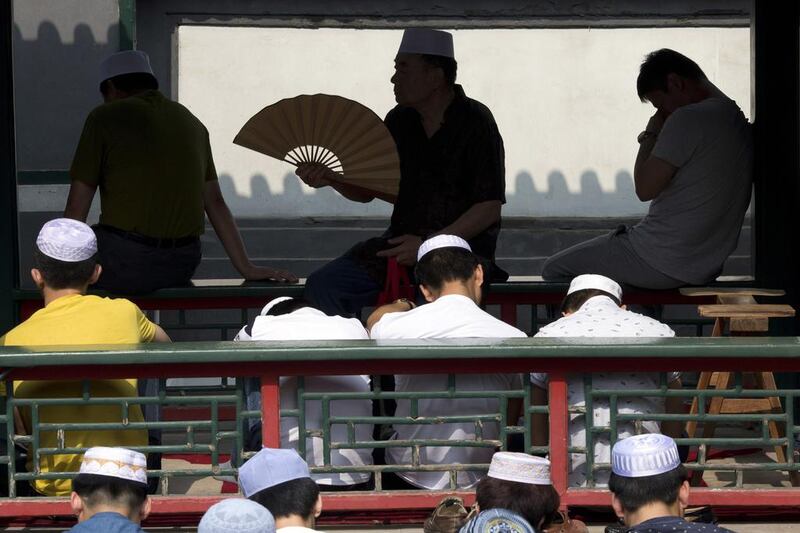 Eid prayers at the Niujie mosque, the oldest and largest mosque in Beijing. Ng Han Guan / AP Photo