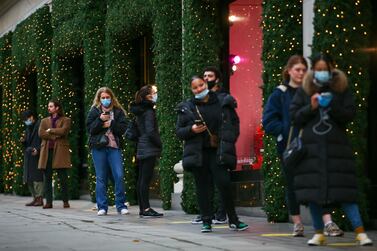 Shoppers queue to enter Selfridges department store . Bloomberg