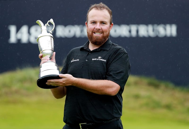 Republic of Ireland's Shane Lowry celebrates with the Claret Jug trophy after winning The Open Championship. Reuters
