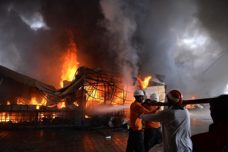 The laze gutted about 100 shops at the baazar.