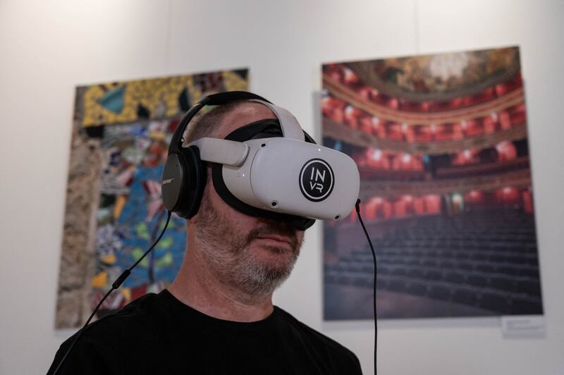 The metaverse includes the platform where users interact, and the tools and hardware needed for an immersive experience, such as virtual reality and augmented reality. Photo: AFP