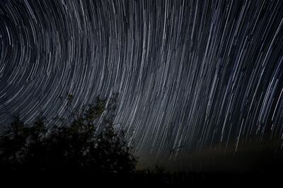 Abu Dhabi, United Arab Emirates - Reporter: N/A: Multiple exposures were combined to produce this image. Startrails are seen during the Lyrids meteor shower over the Abu Dhabi desert. Wednesday, April 22nd, 2020. Abu Dhabi. Chris Whiteoak / The National