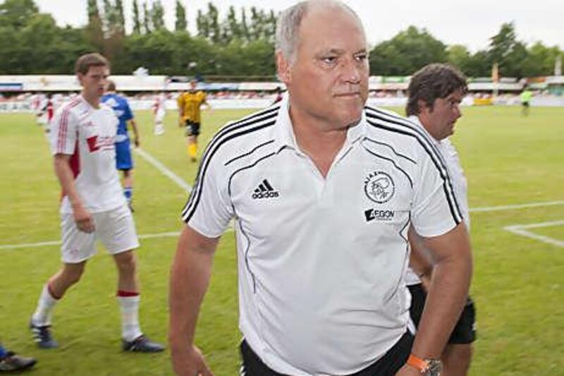 Martin Jol committed his future to Ajax yesterday, leaving Fulham still searching for Roy Hodgson's replacement.