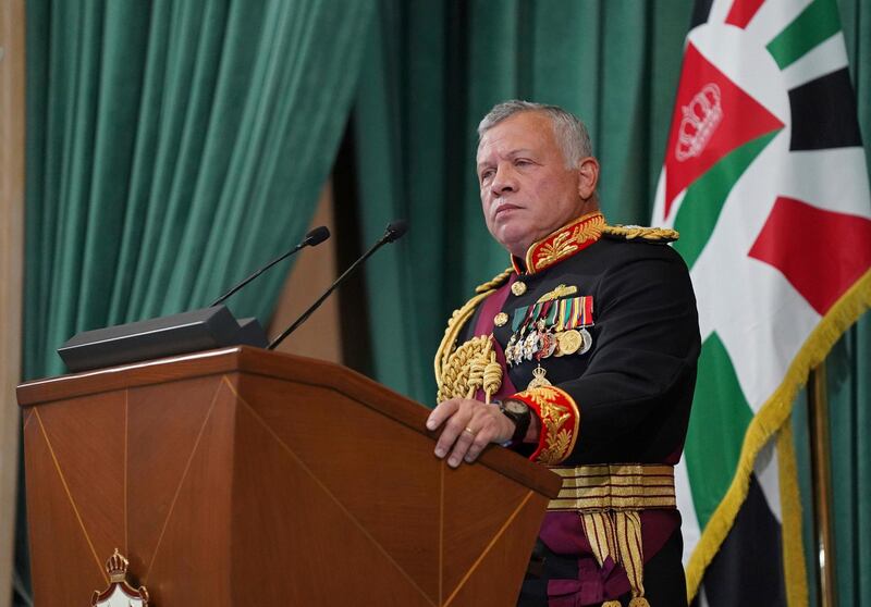 FILE - In this Dec. 10, 2020  photo released by the Royal Hashemite Court, Jordan's King Abdullah II gives a speech during the inauguration of the 19th Parliament's non-ordinary session, in Amman Jordan.  Jordanâ€™s army chief of staff says the half-brother of King Abdullah II was asked to â€œstop some movements and activities that are being used to target Jordanâ€™s security and stability.â€ The army chief of staff denied reports Saturday, April 3, 2021, that Prince Hamzah was arrested. He said an investigation is still ongoing and its results will be made public â€œin a transparent and clear form.â€   (Yousef Allan/The Royal Hashemite Court via AP, File)