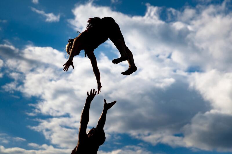 Members of the street performer band 'L'Odeur de la Sciure' perform at 'La Ruche', during the 43th edition of the Paleo Festival, in Nyon, Switzerland.  EPA / VALENTIN FLAURAUD