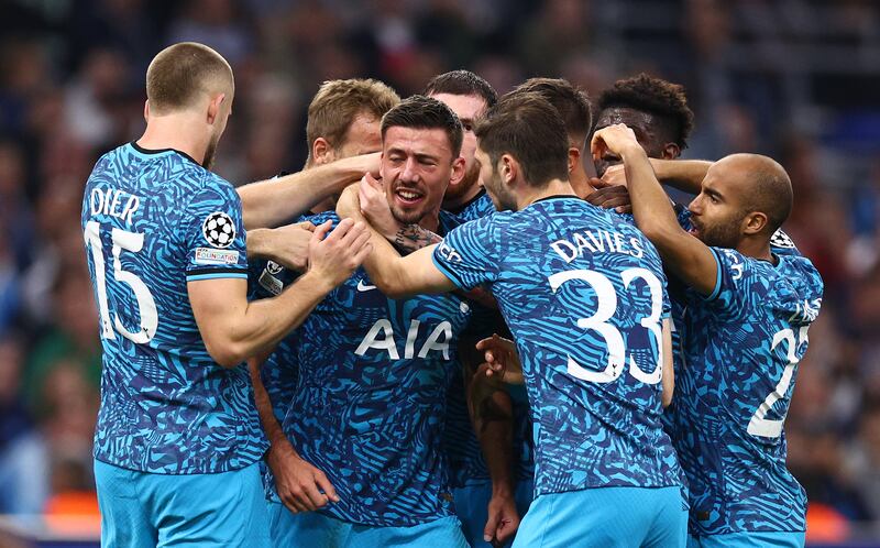 Spurs players mob Clement Lenglet after defender made it 1-1. Getty