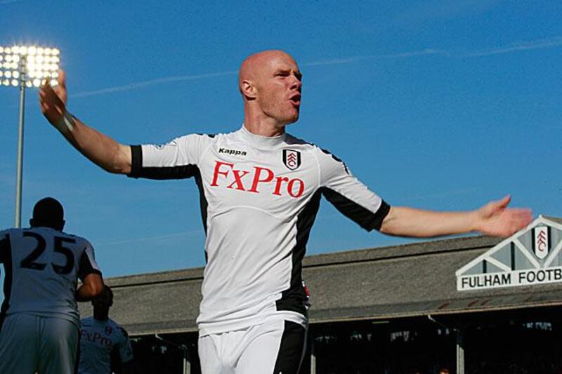 Andy Johnson celebrates his hat-trick at Craven Cottage as Fulham routed their London rivals QPR 6-0 in their first top-flight match.

Lefteris Pitarakis / AP Photo