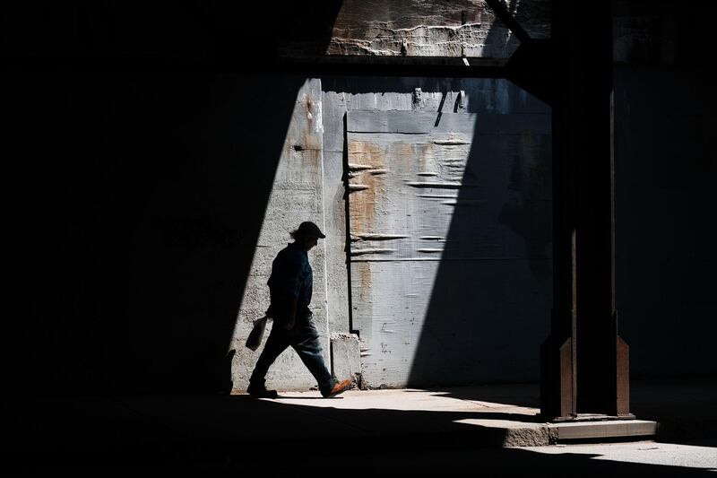 A man walks along a street in Lawrence, Massachusetts. AFP