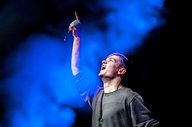 Dutch DJ Martin Garrix performs at the Heineken Music Hall after being revealed as the winner of the DJ Mag Top 100 DJs Poll 2016, during the Amsterdam Dance Event (ADE) in Amsterdam on October 19, 2016, becoming the youngest ever No.1 DJ. / AFP PHOTO / ANP / Ferdy Damman / Netherlands OUT