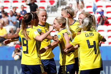 Elin Rubensson celebrates with teammates after scoring Sweden's fifht goal against Thailand. Reuters