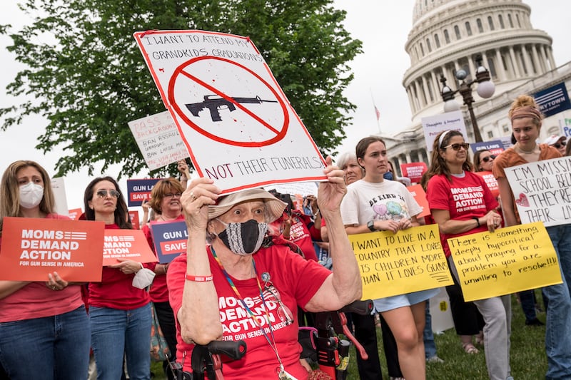 Activists join Senate Democrats outside the Capitol to demand action on US gun control legislation. AP