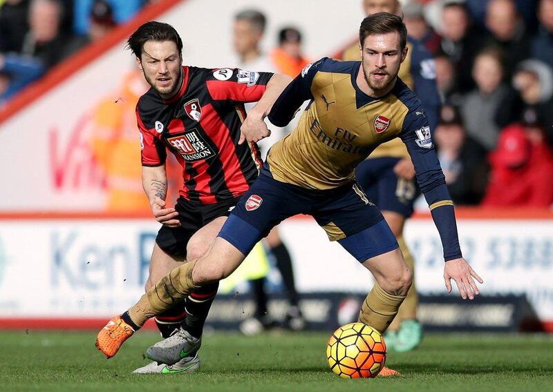 Aaron Ramsey, right, was a part of the Arsenal side that returned to winning ways against Bournemouth on Sunday. (ohn Walton / PA