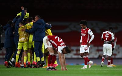 Soccer Football - Europa League - Semi Final Second Leg - Arsenal v Villarreal - Emirates Stadium, London, Britain - May 6, 2021 Arsenal's Pablo Mari and Willian look dejected as Villarreal celebrate after the match REUTERS/Hannah Mckay