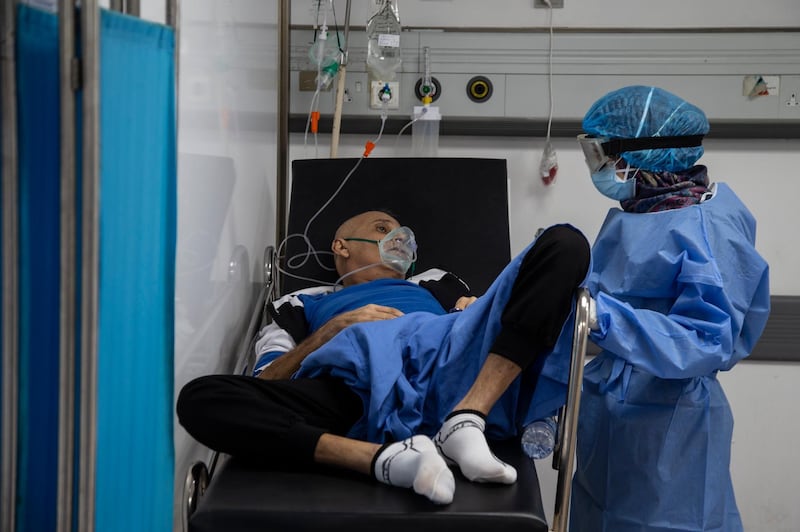 A nurse treats a patient in the Covid-19 intensive care unit at Rafic Hariri University Hospital in Beirut, Lebanon. EPA