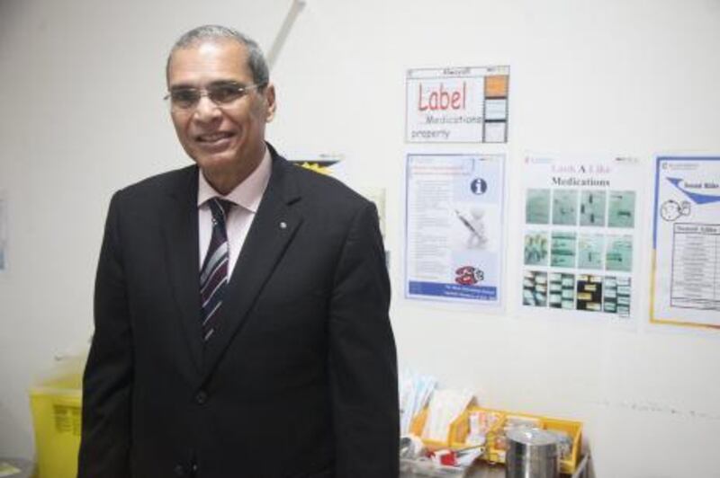 Abu Dhabi, UAE, July 25, 2013:

In conjunction with world Hepatitis day the head of Heptology at Noor Hospital, Dr. Ali Al Sayed, has decided to speak to media to help raise awareness of the illness. 

Seen here is Dr. Al Sayed inside of the consultation room. Mr. Al Sayed says the most common forms of Hepatitis are B and C. Hep B has a vaccine, Hep C does not, but it is treatable. People who have not yet been vaccinated should get blood tests done immediately as it only takes 6 weeks for the incubation process to develop into the full blown illness.

Lee Hoagland/The National *** Local Caption ***  LH0725_ALI_AL_SAYED_004.JPG