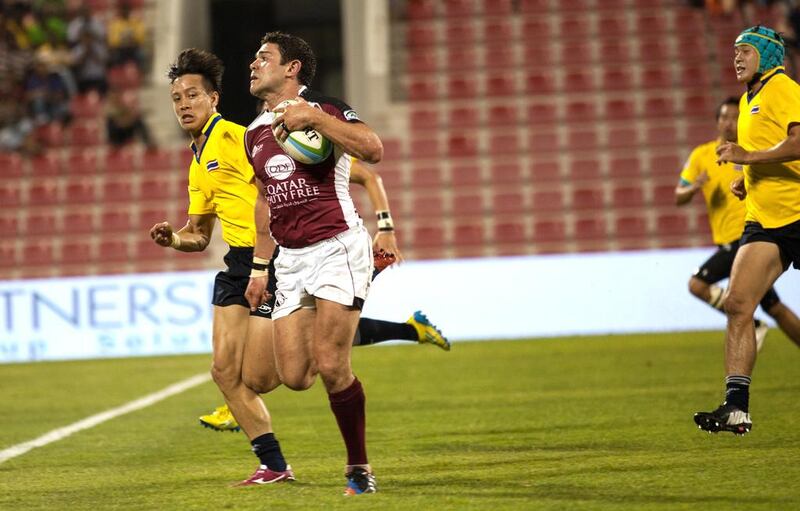Liam Frost, centre, is happy with Qatar’s progress in Asian rugby but is unsure about the next level. Courtesy Elite Step