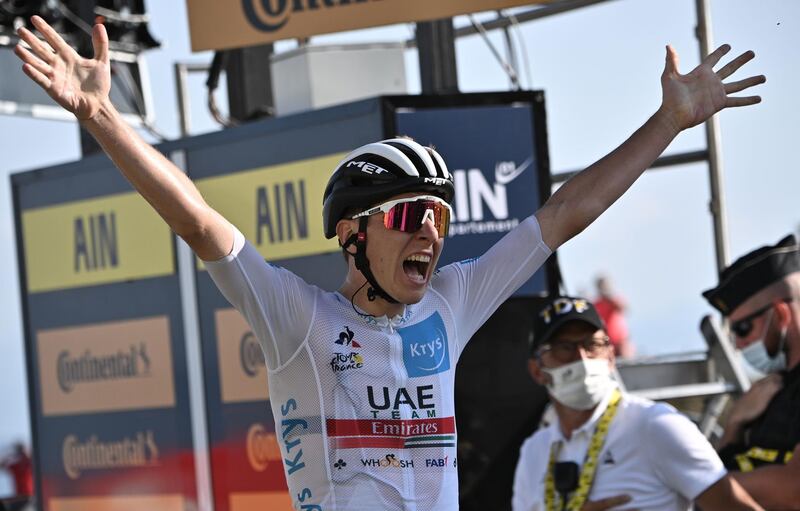 Team UAE Emirates rider Tadej Pogacar celebrates after winning Stage 15 of the Tour de France on Sunday, September 13. AFP
