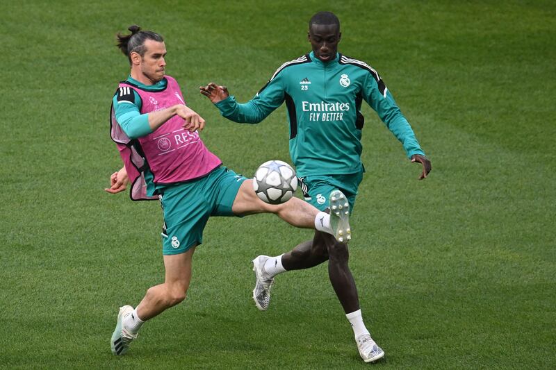 Real Madrid forward Gareth Bale during training with Ferland Mendy. AFP