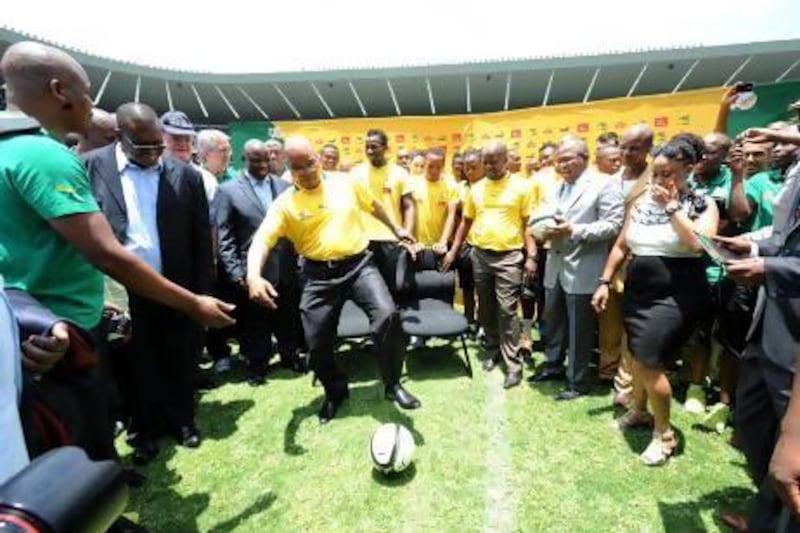 South Africa President Jacob Zuma practices ball skills while visiting South Africa's national football team at Orlando Stadium on January 15. Bafana Bafana players are in training for the 2013 Africa Cup of Nations, which starts Friday.