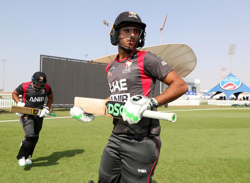 Abu Dhabi, United Arab Emirates - October 22, 2018: Chirag Suri of the UAE comes out to bat in the match between the UAE and Australia in a T20 international. Monday, October 22nd, 2018 at Zayed cricket stadium oval, Abu Dhabi. Chris Whiteoak / The National