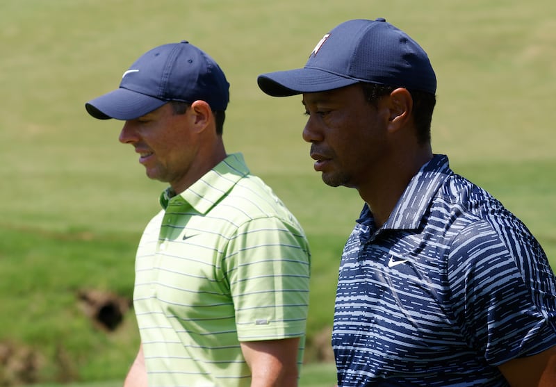 Tiger Woods, right, and Rory McIlroy on the second hole during the first round of the 2022 PGA Championship at the Southern Hills Country Club in Tulsa, Oklahoma, USA. EPA