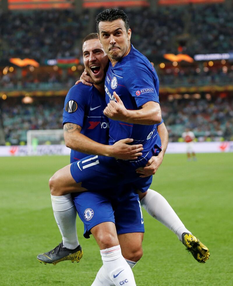 Chelsea's Pedro celebrates scoring their second goal with Eden Hazard. REUTERS