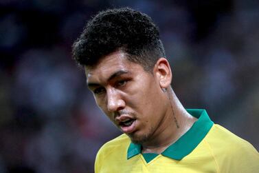 Liverpool striker Roberto Firmino has been called up to Brazil's 23-man squad for next month's friendlies against Argentina and South Korea. EPA