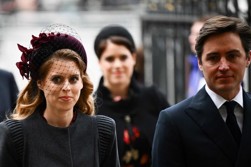 Princess Beatrice, daughter of Prince Andrew, and her husband Edoardo Mapelli Mozzi arrive to attend the service. AFP