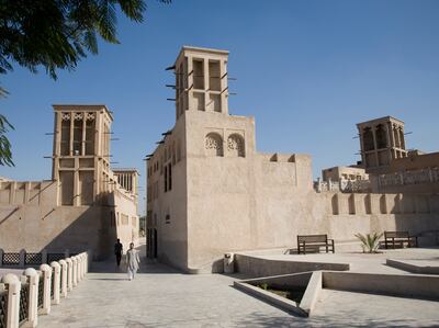 Wind towers modelled on traditional architecture in Dubai's Al Fahidi Neighbourhood. Getty Images