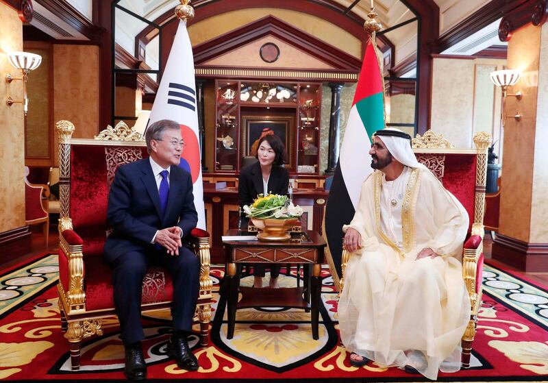 South Korean President Moon Jae-in speaks with Mohammed bin Rashid, Vice President and Ruler of Dubai, during a meeting at Zabeel Palace in Dubai on Tuesday. EPA / Yonhap