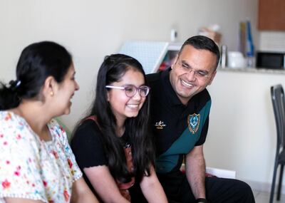 DUBAI, UNITED ARAB EMIRATES. 30 JULY 2020. 
Rahu Bohra and his wife Pooja and daughter Rushda.
Dubai resident Rahul Bohra will get tested every three days after the eid break to ensure he can make it to a construction project in Abu Dhabi he is working on. 
(Photo: Reem Mohammed/The National)

Reporter:
Section: