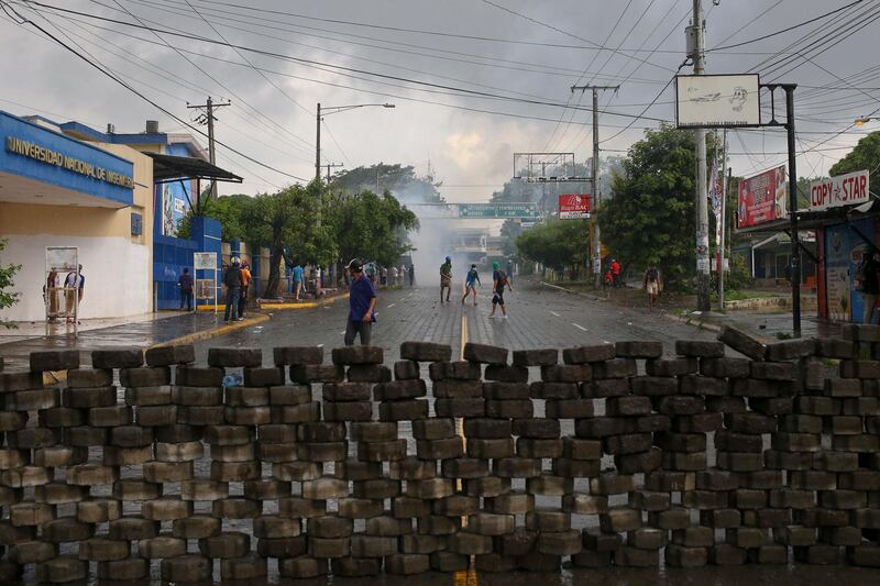 A barricade stands outside the main entrance of the National Engineering University during a protest against Nicaragua's President Daniel Ortega in Managua, Nicaragua. Esteban Felix / AP Photo