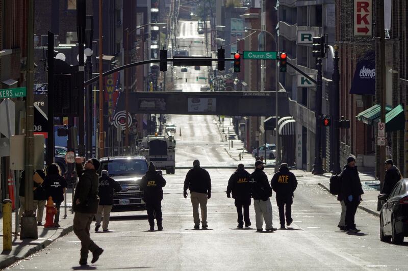 Investigators work near the site of an explosion from the day before in Nashville, Tennessee, U.S.  REUTERS