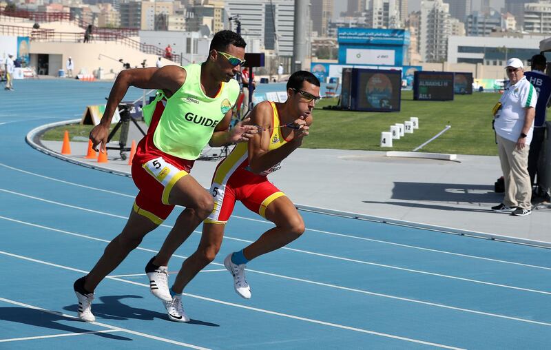 DUBAI, UNITED ARAB EMIRATES , Nov 7  – 2019 :- Joan Munar Martinez (ESP right) with his guide participating in the men’s 400m T12 round 1 heat 4 during the Dubai 2019 World Para Athletics Championship held at Dubai Club For People Of Determination in Dubai. ( Pawan Singh / The National )  For New. Story by Ramola