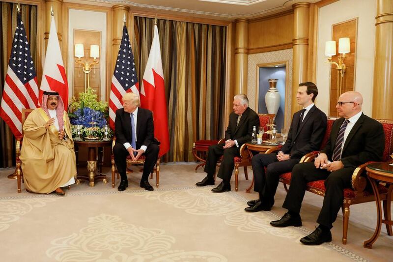 Donald Trump, second left, is flanked by secretary of state Rex Tillerson, third right, senior advisor Jared Kushner, second right, and national security advisor HR McMaster, right, meets with Bahrain’s King Hamad bin Isa Al Khalifa, left, in Riyadh. Jonathan Ernst / Reuters